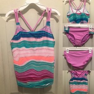 More than magic bathing suit in size L(10/12) plus